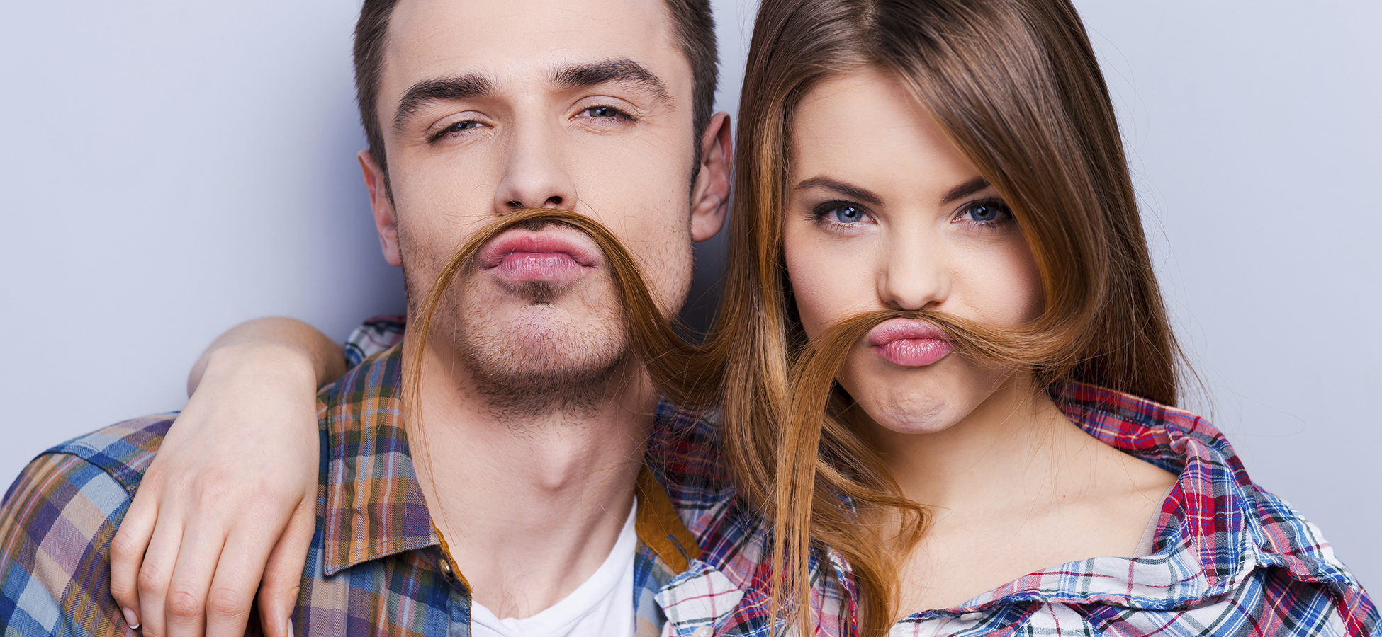 Funny moustache. Beautiful young loving couple making fake moust Conduite accompagnée permis Mulhouse